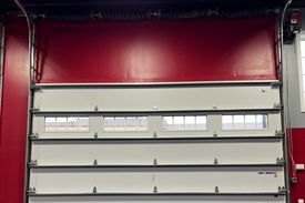 What causes a noisy garage door and how can it be fixed?