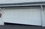 When Should a Garage Door Be Repaired Versus Fully Replaced?