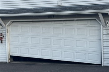 When Should a Garage Door Be Repaired Versus Fully Replaced?