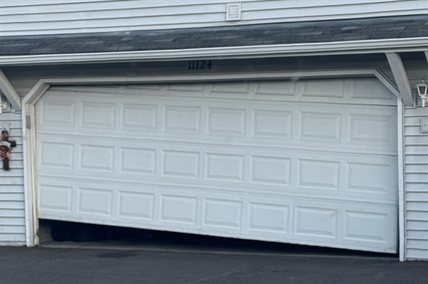 When Should a Garage Door Be Repaired Versus Fully Replaced?